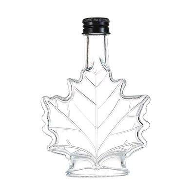 Bouteille de boissons en verre industriel de couleur personnalisée en forme de feuille d'érable 50 ml 100 ml 250 ml