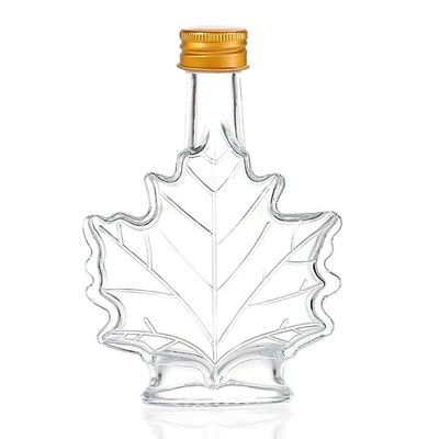 Bouteille de boissons en verre industriel de couleur personnalisée en forme de feuille d'érable 50 ml 100 ml 250 ml