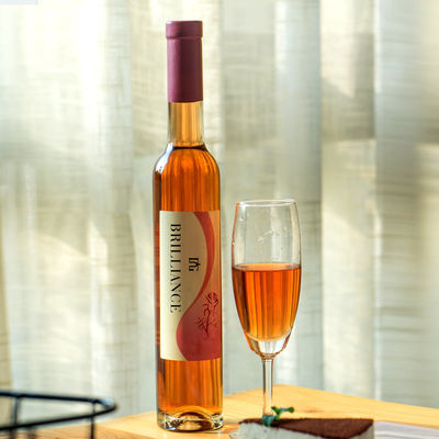 Bouteille de verre ronde de 200 ml 375 ml 500 ml 750 ml 1000 ml avec couvercle en liège et conception personnalisée