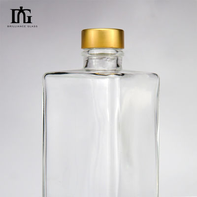 Bouteille de verre de vodka transparente de 750 ml en forme carrée avec le logo du client acceptable