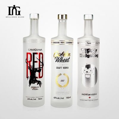 Bouteille ronde transparente d'alcool avec étiquette à chaud et bouchon de liège Capacité 750 ml