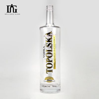 Bouteille ronde transparente d'alcool avec étiquette à chaud et bouchon de liège Capacité 750 ml