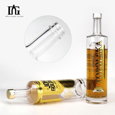 Bouteille ronde transparente d'alcool avec étiquette à chaud et bouchon de liège Capacité 750 ml