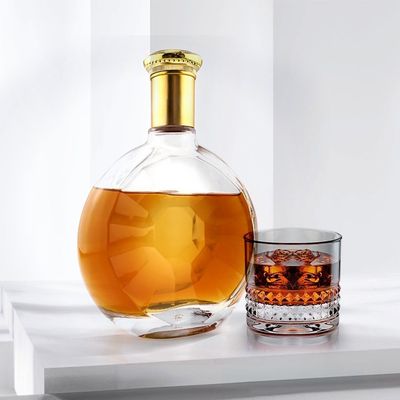 Bouteille en verre à surface lisse irrégulière ronde sur mesure pour la production de whisky gin de 700 ml