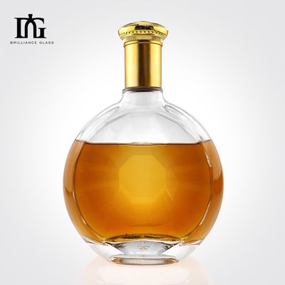 Bouteille en verre à surface lisse irrégulière ronde sur mesure pour la production de whisky gin de 700 ml