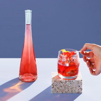 Bouteille en verre transparent avec fond rose de capacité 500 ml/750 ml