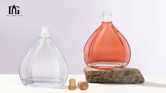 Bouteille ronde transparente en verre de 700 ml de 750 ml de vodka, de whisky et de rhum avec bouchon à vis et échantillon