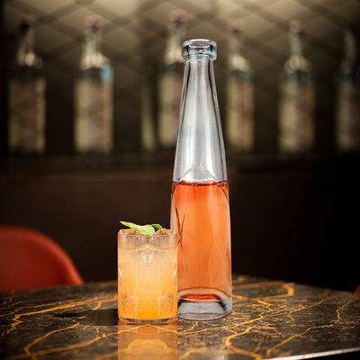 Bouteille de verre en forme unique sur mesure pour les liqueurs haut de gamme et les boissons bières