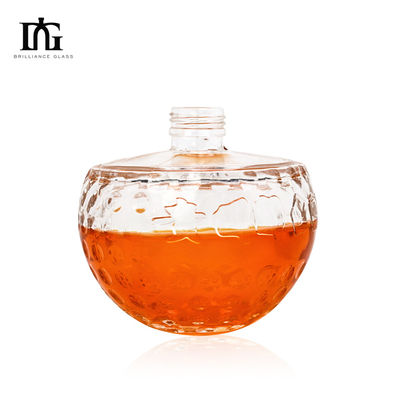 Bouteille en verre transparent de 700 ml avec forme de crâne unique et liège gravé