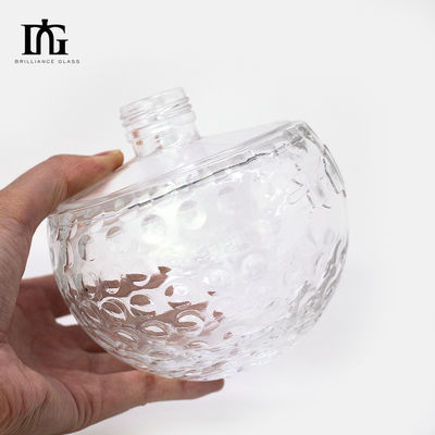 Bouteille en verre transparent de 700 ml avec forme de crâne unique et liège gravé