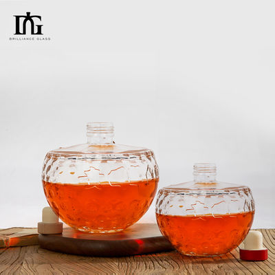 Bouteille en verre transparent de 700 ml avec forme de crâne unique et liège gravé