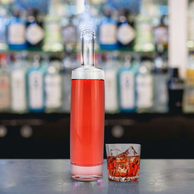 Matériau de base Verre Bouteilles de verre rondes sur mesure 500 ml 750 ml pour le vin Liqueur eau de boisson